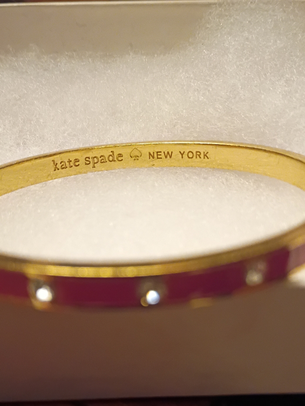 kate spade gold-tone bangle with pink enamel and crystal accents